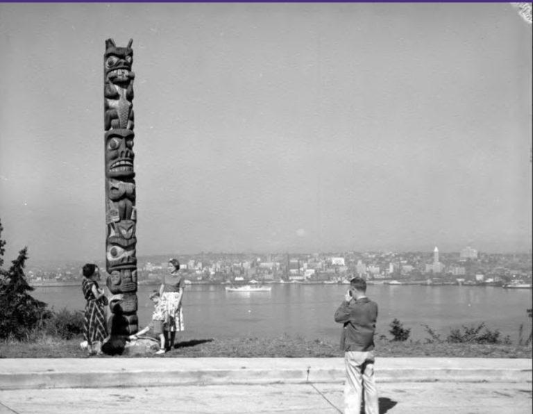 How did totem poles become a symbol of Seattle?